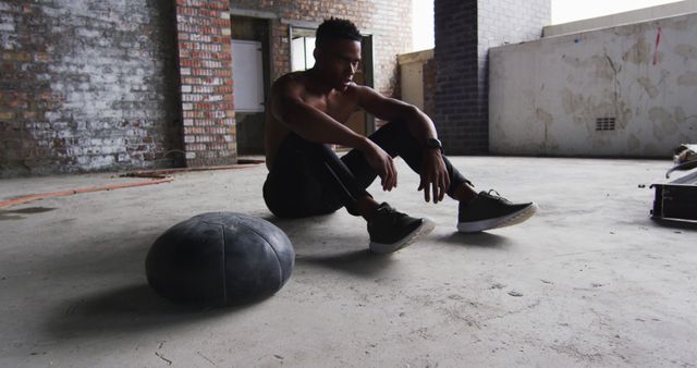 Tired Athlete Resting on Gym Floor after Intense Workout - Download Free Stock Images Pikwizard.com