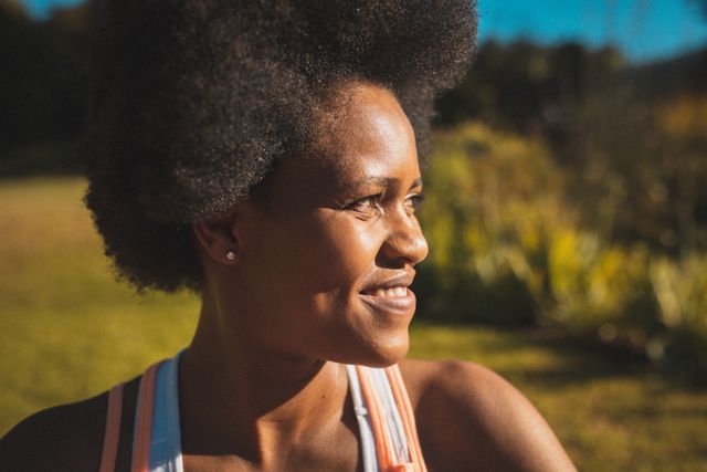 African American Woman Smiling Outdoors in Sunlight - Download Free Stock Images Pikwizard.com