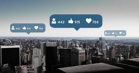 Social Media Concept Over Urban Skyline with Notification Icons