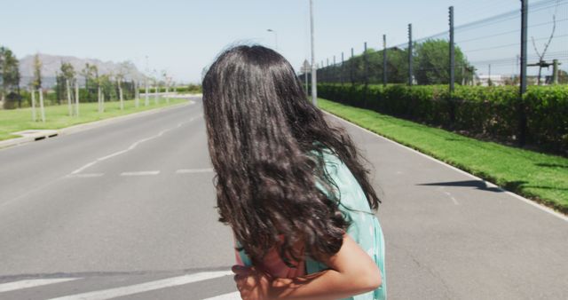 Young Girl with Long Hair Running on Empty Road - Download Free Stock Images Pikwizard.com