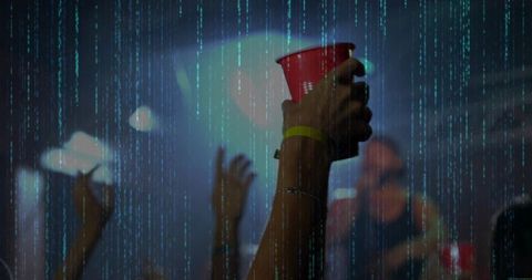 Energetic club scene with raised cup and vibrant lighting