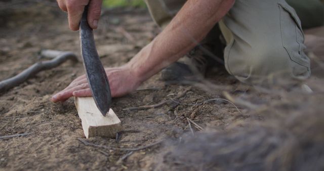 Person Carving Wood Outdoors with Knife - Download Free Stock Images Pikwizard.com