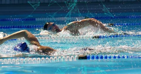 Swimmers Racing in Dedicated Pool Lane Showcasing Speed and Endurance