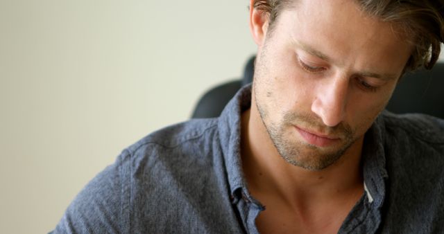 Thoughtful Young Man Sitting and Reflecting - Download Free Stock Images Pikwizard.com