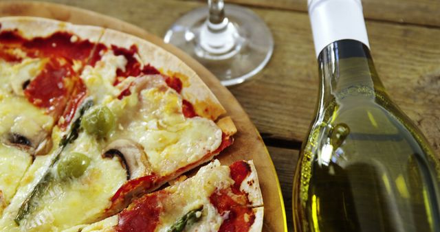 Delicious Pizza with White Wine on Rustic Wooden Table - Download Free Stock Images Pikwizard.com