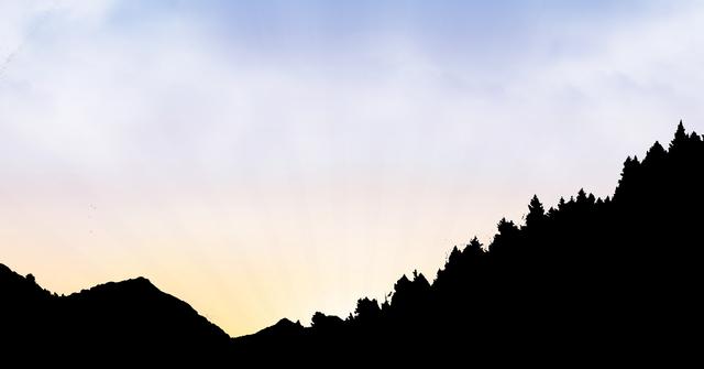 Digital composite of Silhouette mountains against sky