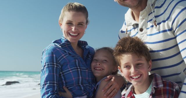 Happy Family Enjoying Day at Beach in Fall - Download Free Stock Images Pikwizard.com