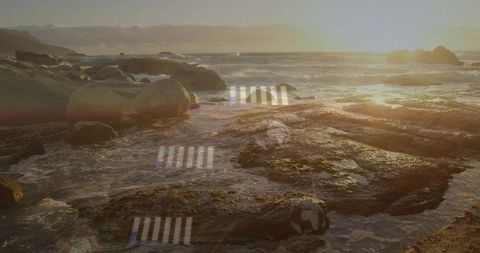Sunlit tidal rock platforms glistening at low tide with tide pools, boulders and warm lens flare