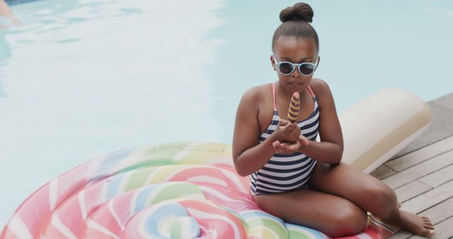 Girl Enjoying Ice Cream Beside Poolside on Sunny Day - Download Free Stock Images Pikwizard.com