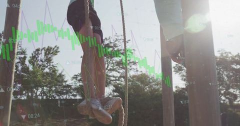 Boys Climbing Ropes with Financial Graph Overlay Adventure Concept