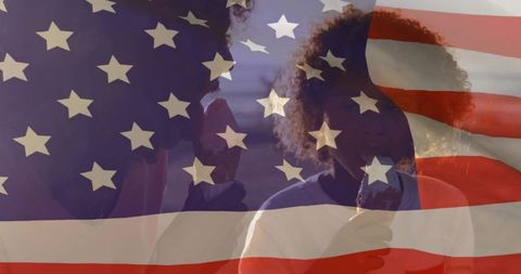 African american mother and son enjoy ice cream with usa flag overlay