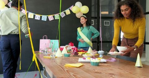 Colleagues Celebrating Office Baby Shower Party Cleanup