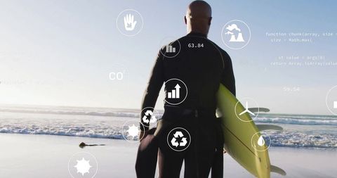 Surfer Holding Yellow Surfboard with Eco Data Icons on Beach