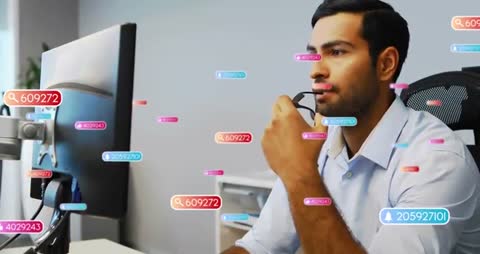 Tech Specialist Interpreting Floating Data Overlays in Modern Workspace