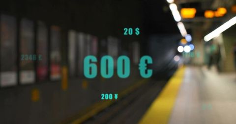 Displaying turquoise 600 € floating graphic over blurred subway platform and tracks