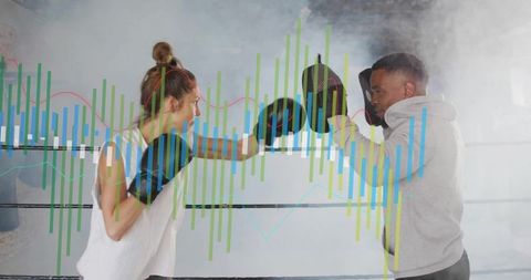 Motivated Female Trainee Boxing with Coach in Gym