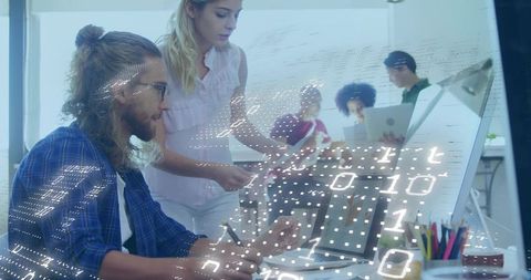 Technology Team Collaborating in Modern Office Environment