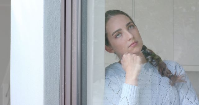 Woman Deep in Thought Looking Through Window - Download Free Stock Images Pikwizard.com