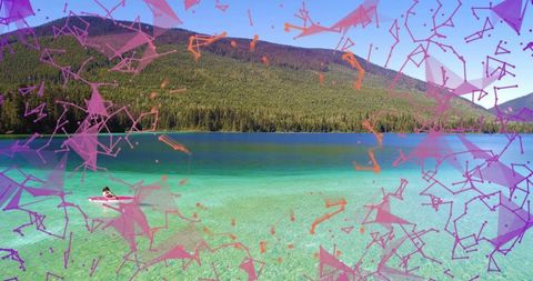 Kayaker Adventuring Through Serene Mountain Lake with Digital Overlay