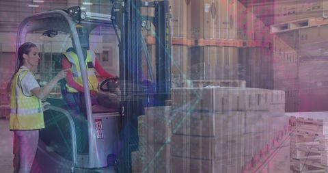 Warehouse workers operating forklift amidst digital hologram graphics