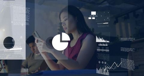 Woman tapping smartphone with data visualization overlay in modern workspace