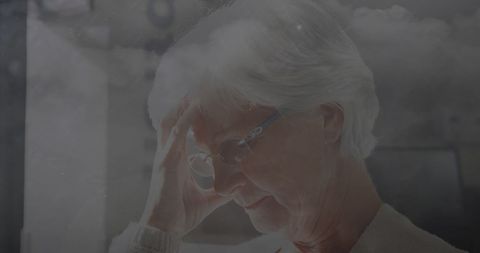 Senior woman stressful thoughts with lightning symbolizing anxiety