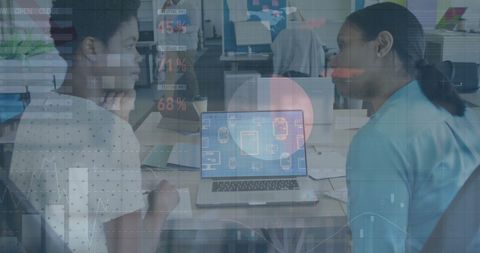 Financial Data Overlay on Diverse Business People Discussing Strategies