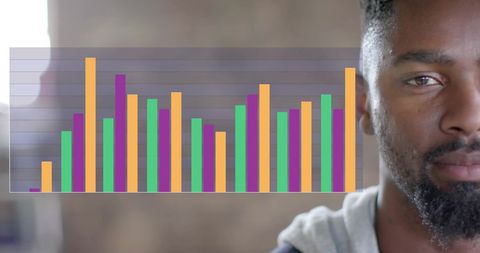 Multicolored Chart Overlay with Professional Businessman