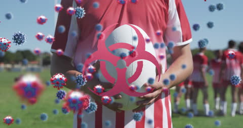 Covid-19 Concept with Rugby Players and Virus Overlay