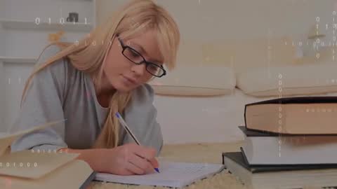 Student Lying on Floor Writing Notes Amidst Binary Code