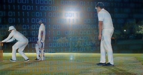 Night cricket bowler finishing delivery with binary data overlay for sports analytics and tech