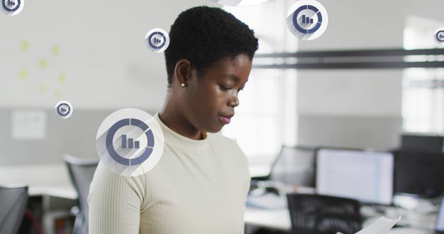 Focused African American Businesswoman Analyzing Documents in Modern Office - Download Free Stock Images Pikwizard.com