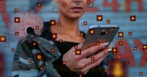 Young woman engaged in social media with digital icons overlay