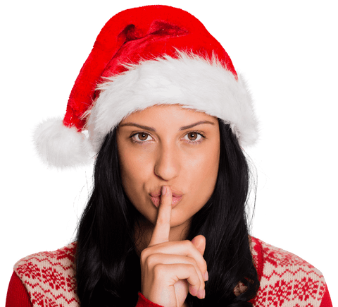 Woman in santa hat holding finger to lips in transparent christmas gesture