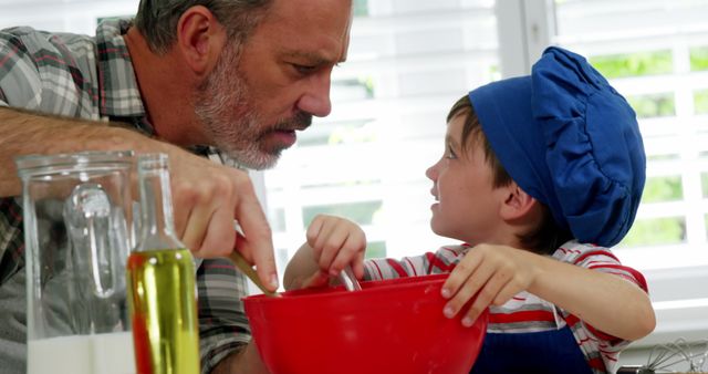Father and Son Baking Together, Mixing Dough in Kitchen - Download Free Stock Images Pikwizard.com