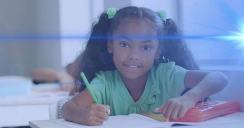 African American Schoolgirl Engaged in Classroom Activity