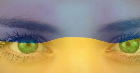 Ukraine flag overlaying woman's eyes symbolizing vision and hope