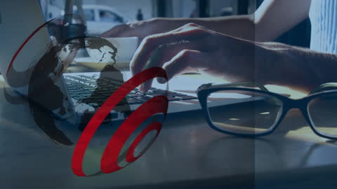 Globe Animation Overlay on Laptop Typing Highlighting Global Business