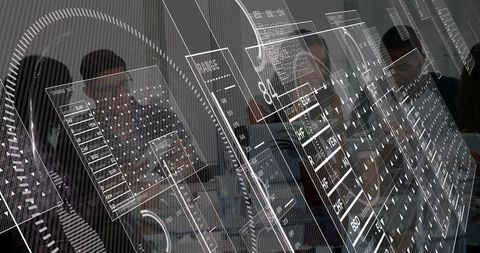 Team of Data Analysts Discussing Digital Innovation in Modern Meeting Room