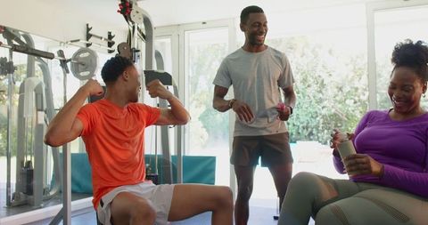 Friends Bonding During Home Gym Workout Session