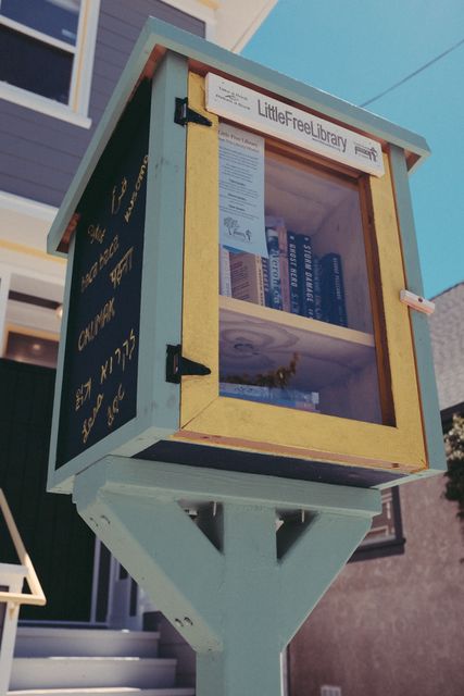 Cozy Little Free Library Box on Residential Street - Download Free Stock Photos Pikwizard.com