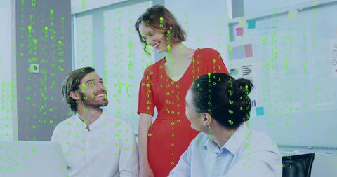 Woman presenting to team with green binary overlay in modern office collaboration