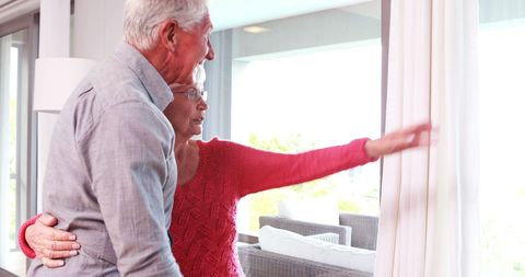 Happy Senior Couple Hugging in Bright Modern Living Room - Download Free Stock Images Pikwizard.com