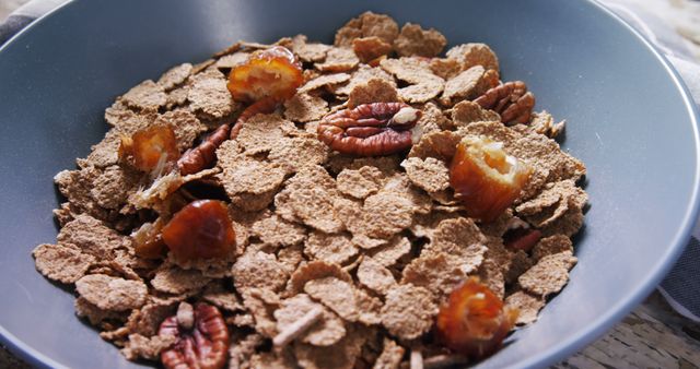 Healthy Breakfast Bowl with Bran Flakes, Dates, and Pecans - Download Free Stock Images Pikwizard.com