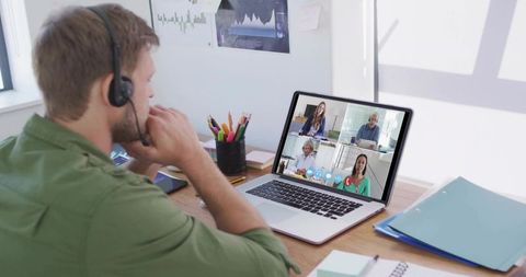 Remote Work Employee Engaging in Virtual Meeting via Laptop