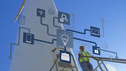 Engineer Analyzing Digital Network Diagram on Wind Turbine