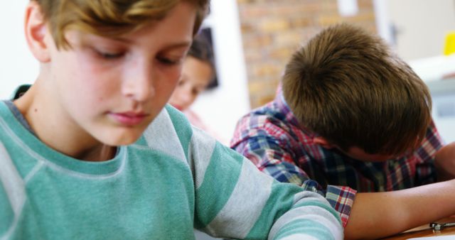 Students Focusing on Homework in Classroom - Download Free Stock Images Pikwizard.com