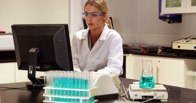 Female Scientist Working at Computer in Modern Laboratory - Download Free Stock Images Pikwizard.com