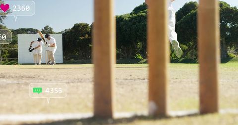 Cricketers celebrating with overlaid social media notifications