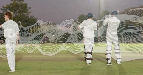 Cricketers walking onto floodlit pitch at dusk with abstract motion wave overlay